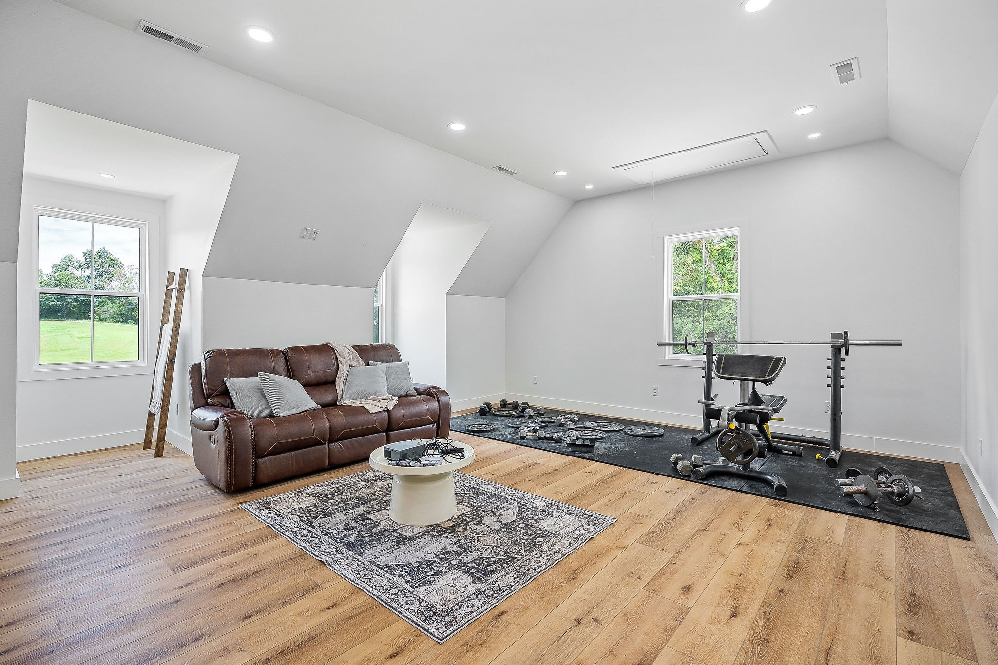250 Dyer Ridge Road Baxter, TN 38544 - Photo 35 of 52 a living room with furniture and a wooden floor
