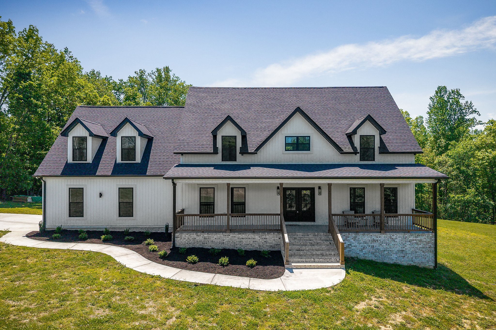 250 Dyer Ridge Road Baxter, TN 38544 - Photo 38 of 52 a front view of a house with a yard