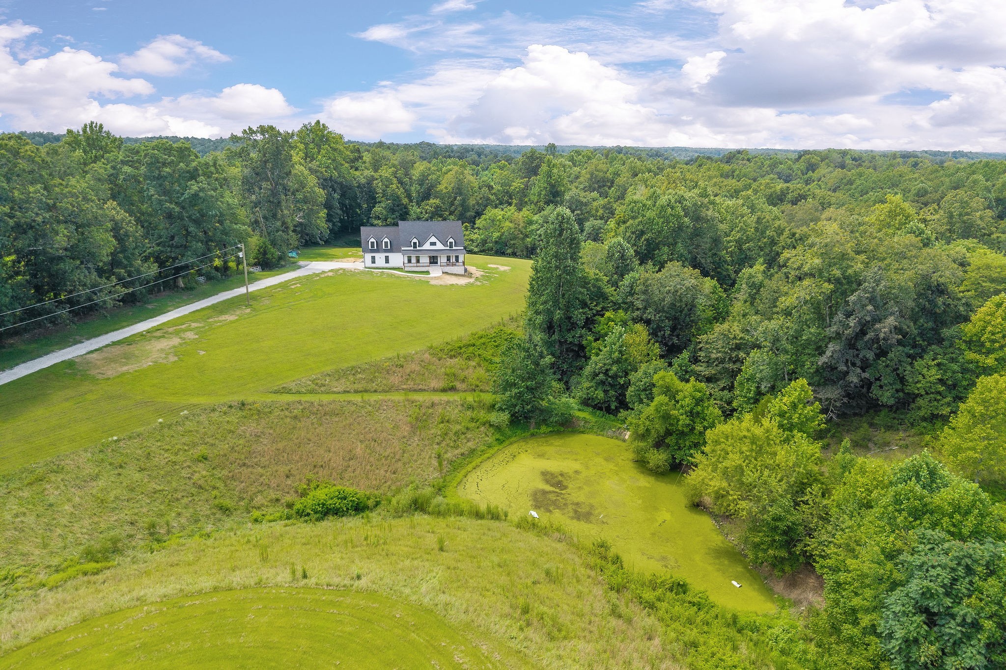 250 Dyer Ridge Road Baxter, TN 38544 - Photo 50 of 52 a view of a swimming pool with a yard