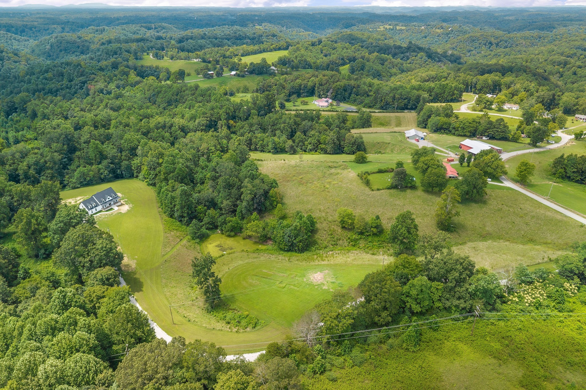 250 Dyer Ridge Road Baxter, TN 38544 - Photo 51 of 52 a view of a lake with a city