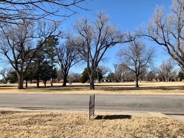 a view of road with trees