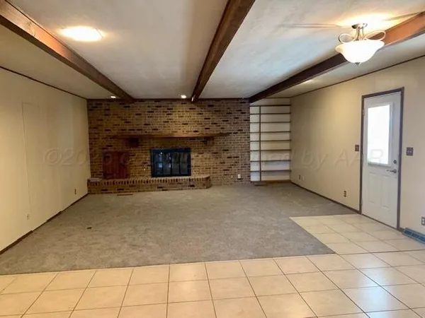 a view of a livingroom with a fireplace