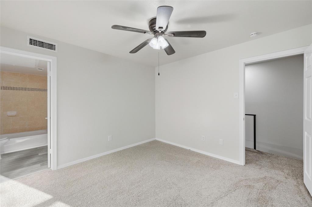 2702 Douglas Avenue, Unit 121 Dallas, TX 75219 - Photo 28 of 34 a view of room with window and ceiling fan