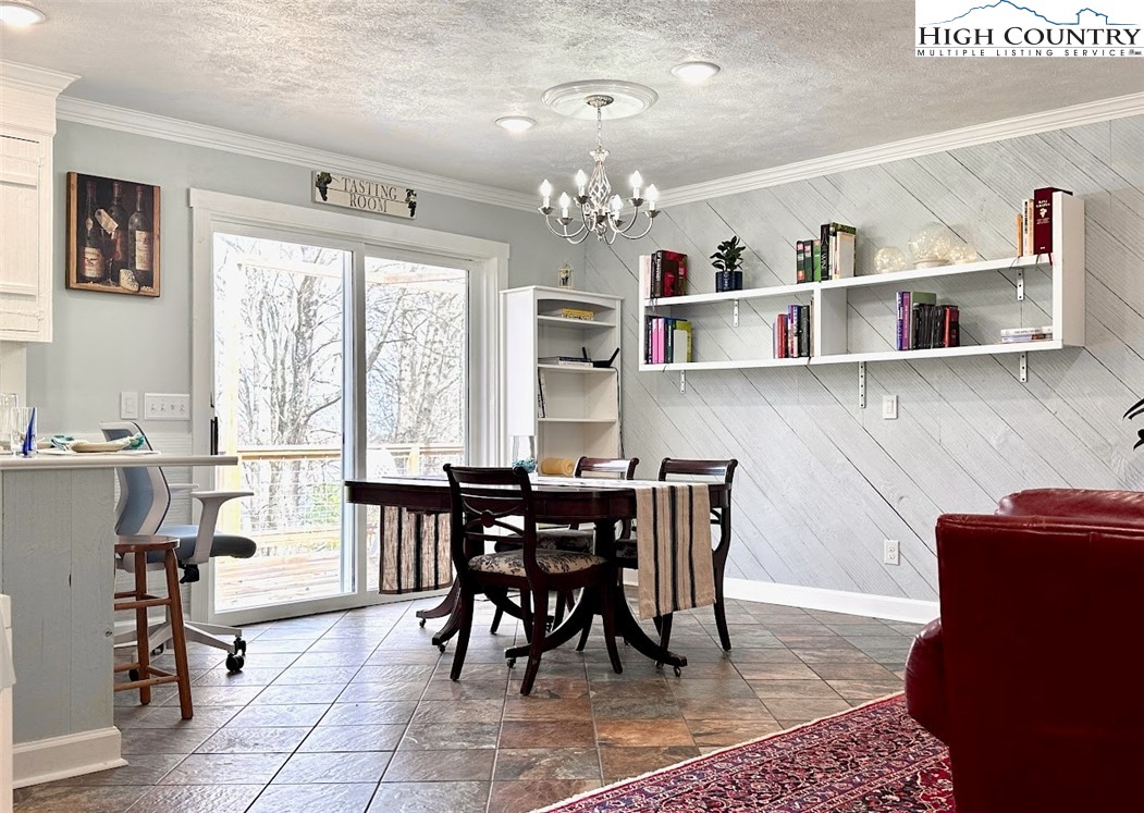 223 Timberlake Sparta, NC 28675 - Photo 18 of 50 a view of a dining room with furniture window and outside view