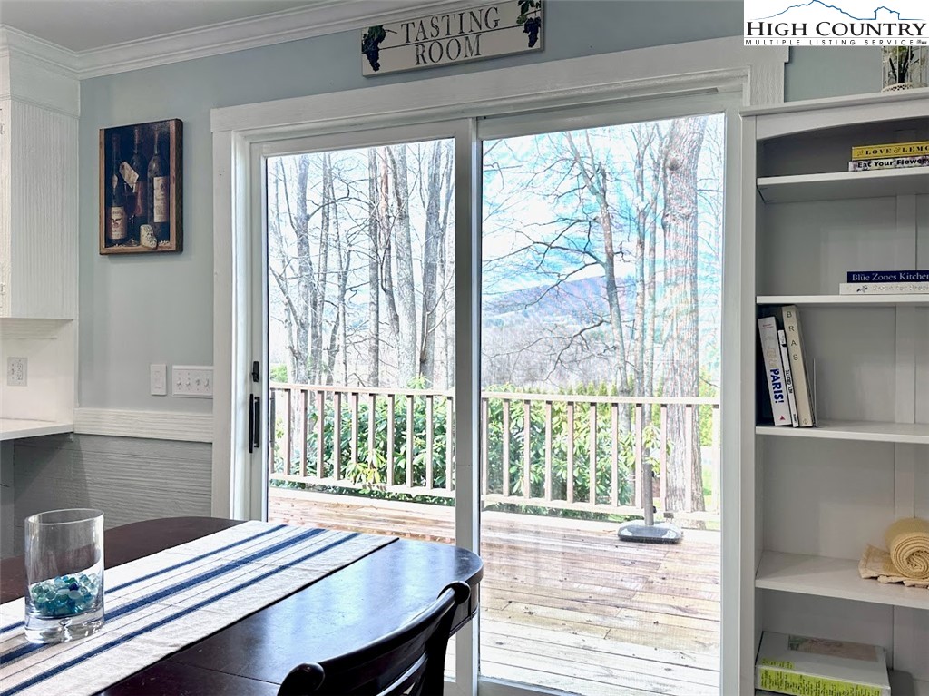 223 Timberlake Sparta, NC 28675 - Photo 19 of 50 a room with wooden floor and a window