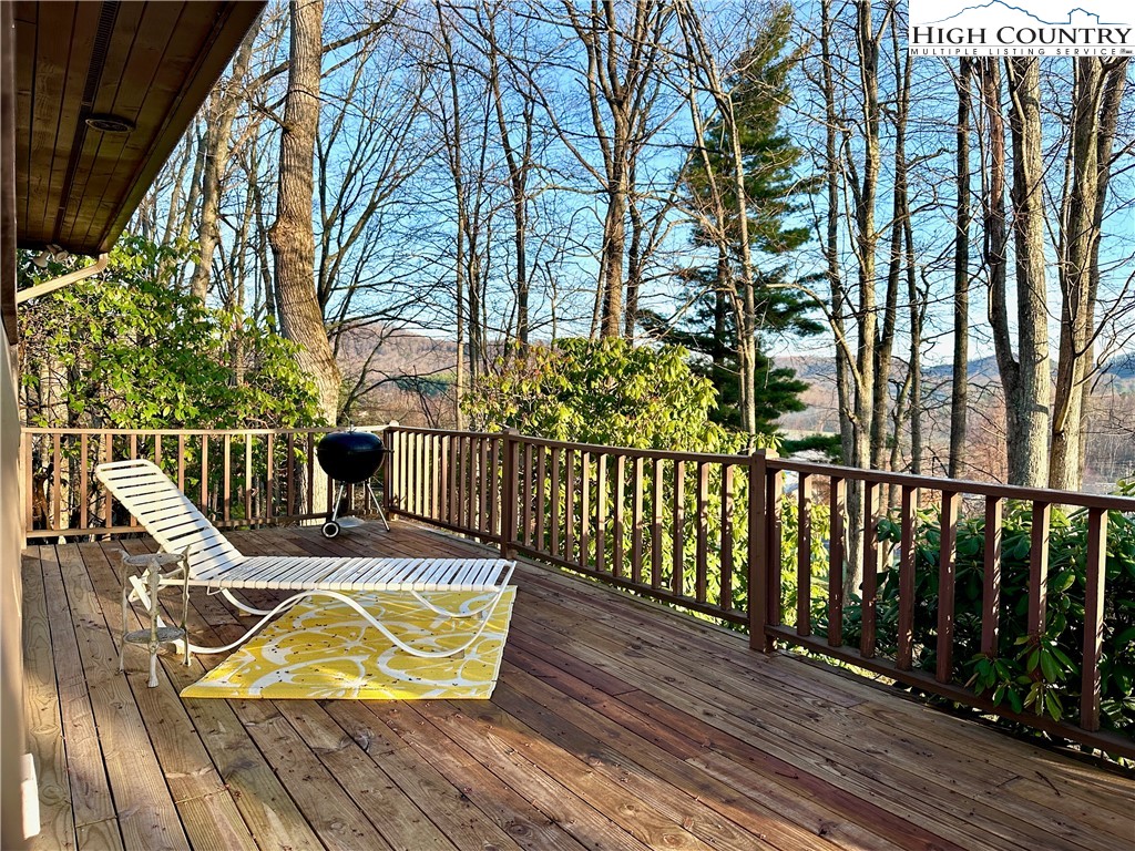 223 Timberlake Sparta, NC 28675 - Photo 20 of 50 a view of a chairs on a deck