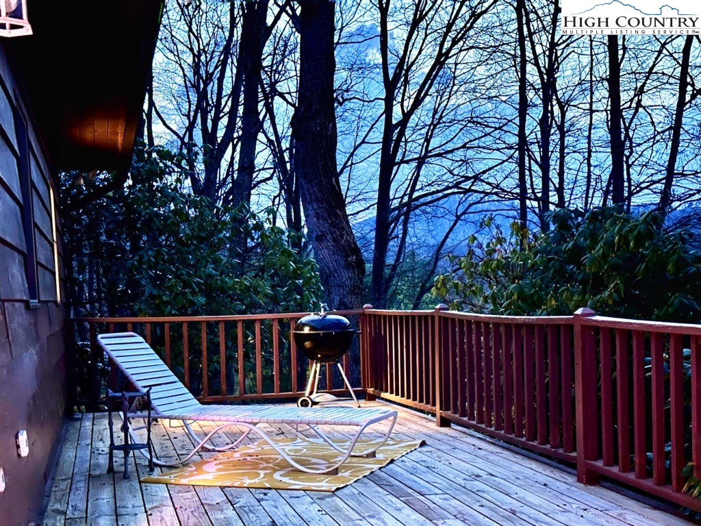 223 Timberlake Sparta, NC 28675 - Photo 21 of 50 a view of balcony with wooden floor and outdoor seating