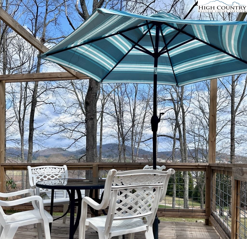 223 Timberlake Sparta, NC 28675 - Photo 22 of 50 a view of balcony with furniture and outdoor seating