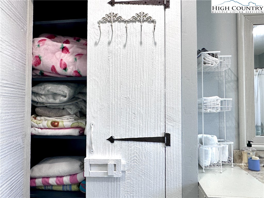 223 Timberlake Sparta, NC 28675 - Photo 30 of 50 a bedroom with furniture and a bed