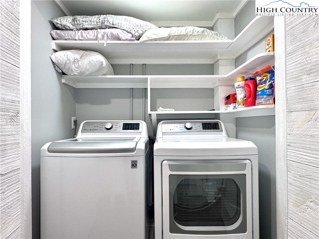 223 Timberlake Sparta, NC 28675 - Photo 37 of 50 a utility room with dryer and washer