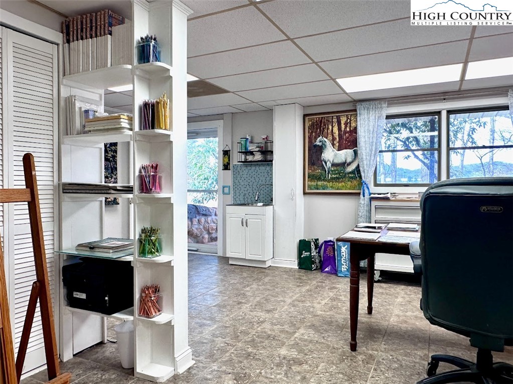 223 Timberlake Sparta, NC 28675 - Photo 41 of 50 a view of a workspace with furniture and a window