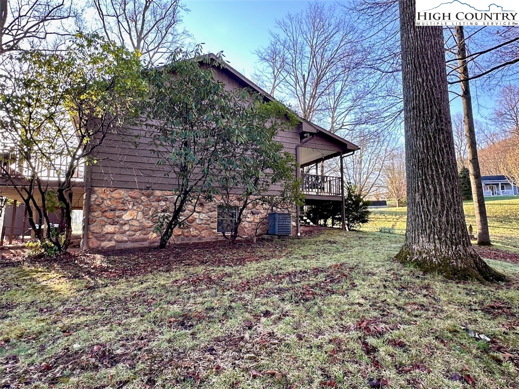223 Timberlake Sparta, NC 28675 - Photo 48 of 50 a view of a house with a yard