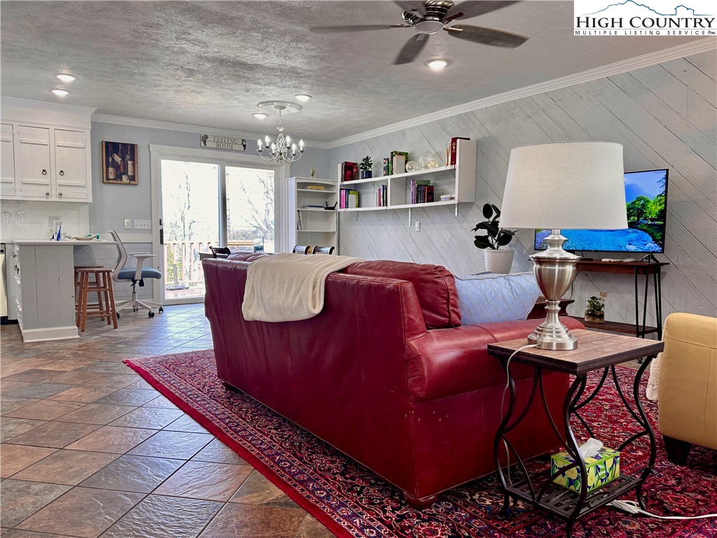 223 Timberlake Sparta, NC 28675 - Photo 9 of 50 a living room with furniture and a table