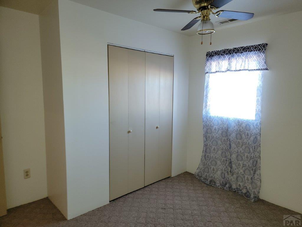 2034 County Rd LL Wiley, CO 81092 - Photo 23 of 29 a view of an empty room with a window