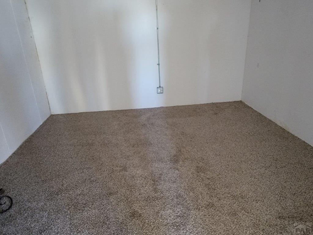 2034 County Rd LL Wiley, CO 81092 - Photo 26 of 29 a view of an empty room