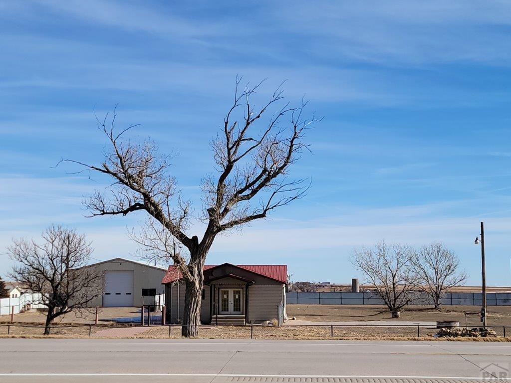 2034 County Rd LL Wiley, CO 81092 - Photo 3 of 29 a view of a houses with a road