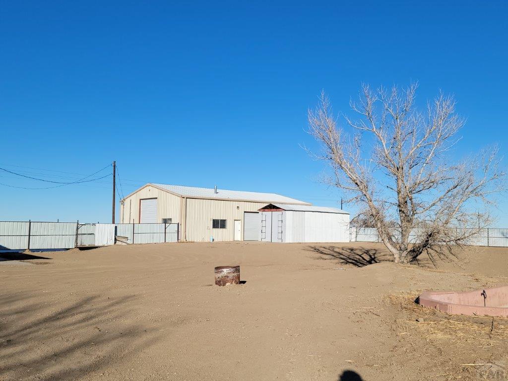 2034 County Rd LL Wiley, CO 81092 - Photo 5 of 29 a view of a house with a snow