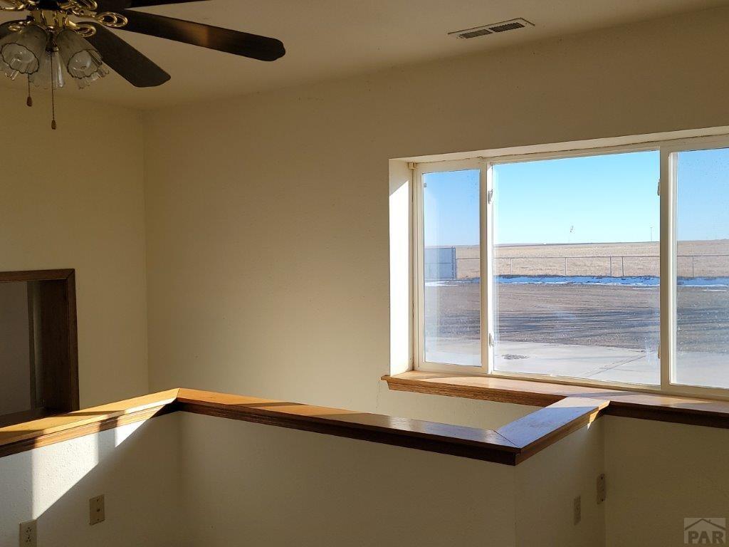 2034 County Rd LL Wiley, CO 81092 - Photo 10 of 29 a view of a air conditioner and a window