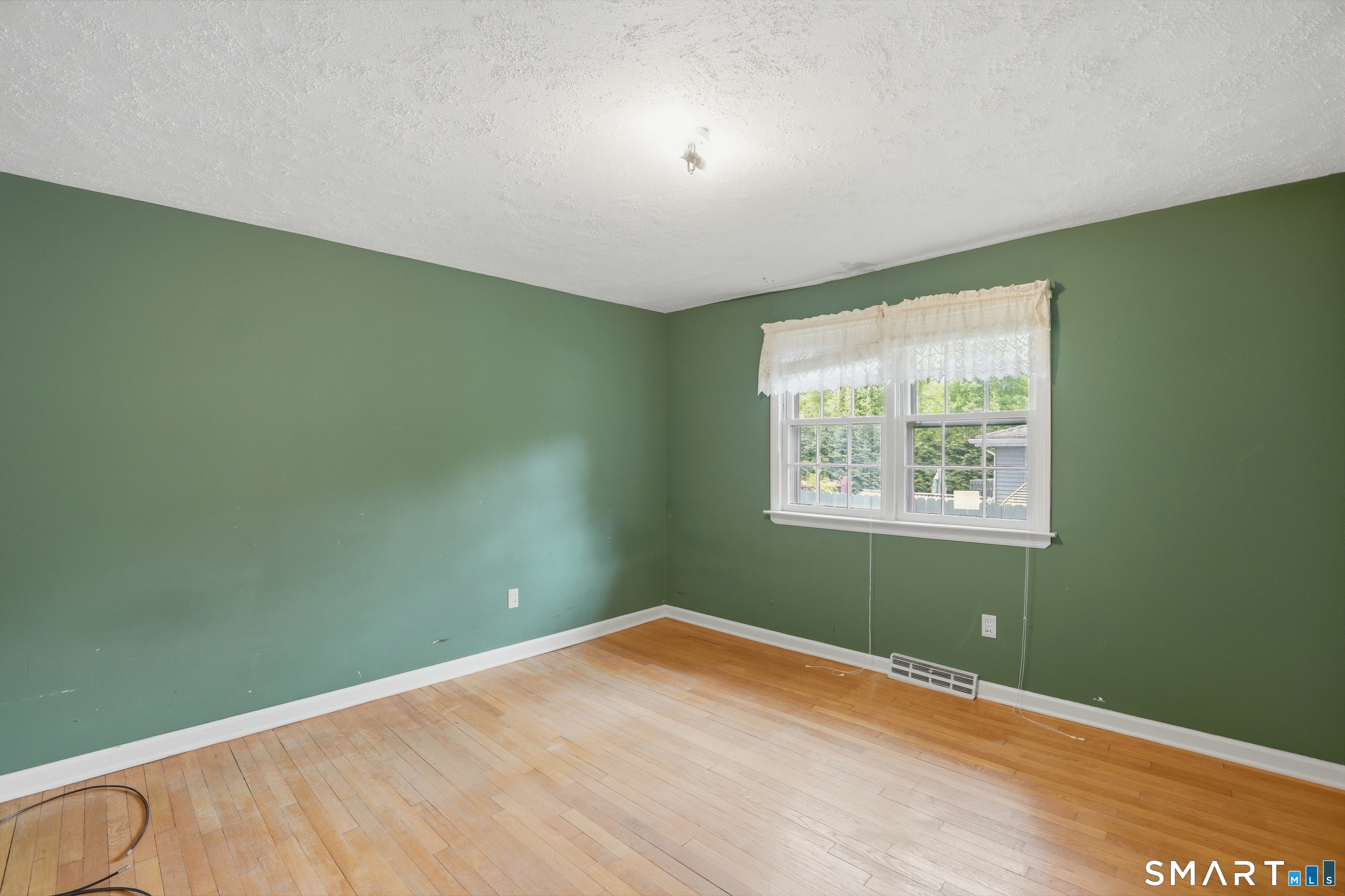 731 Still Hill Road Hamden, CT 06518 - Photo 19 of 40 an empty room with a window