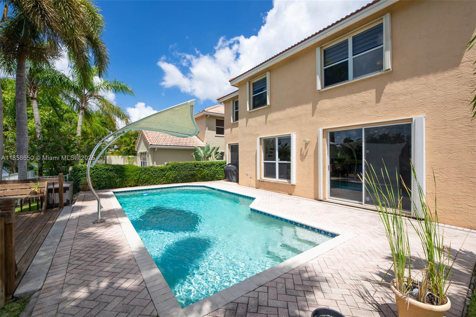18196 Southwest 29th Street Miramar, FL 33029 - Photo 48 of 54 a view of a house with backyard and sitting area