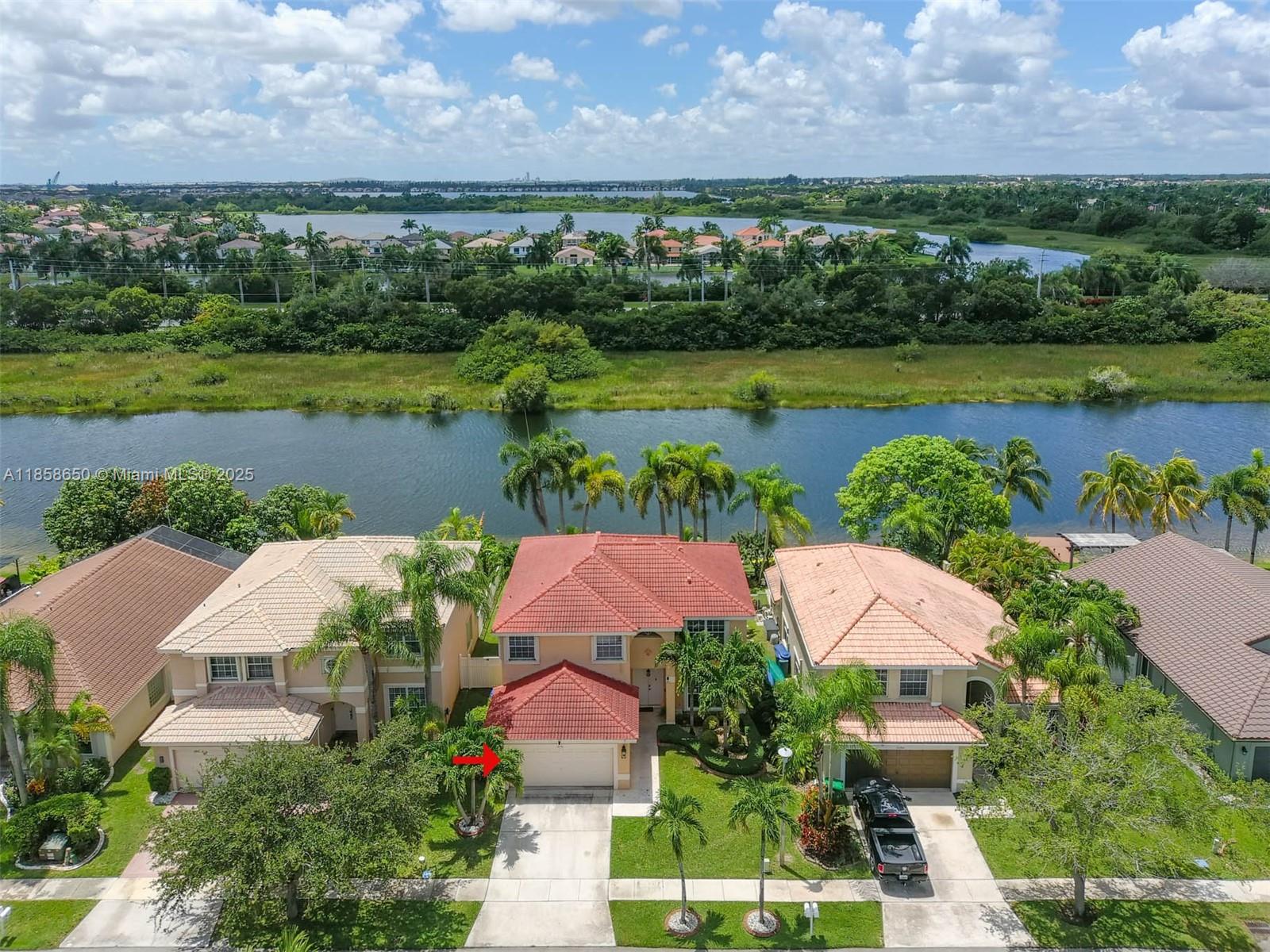 18196 Southwest 29th Street Miramar, FL 33029 - Photo 5 of 54 an aerial view of residential houses with outdoor space and lake view