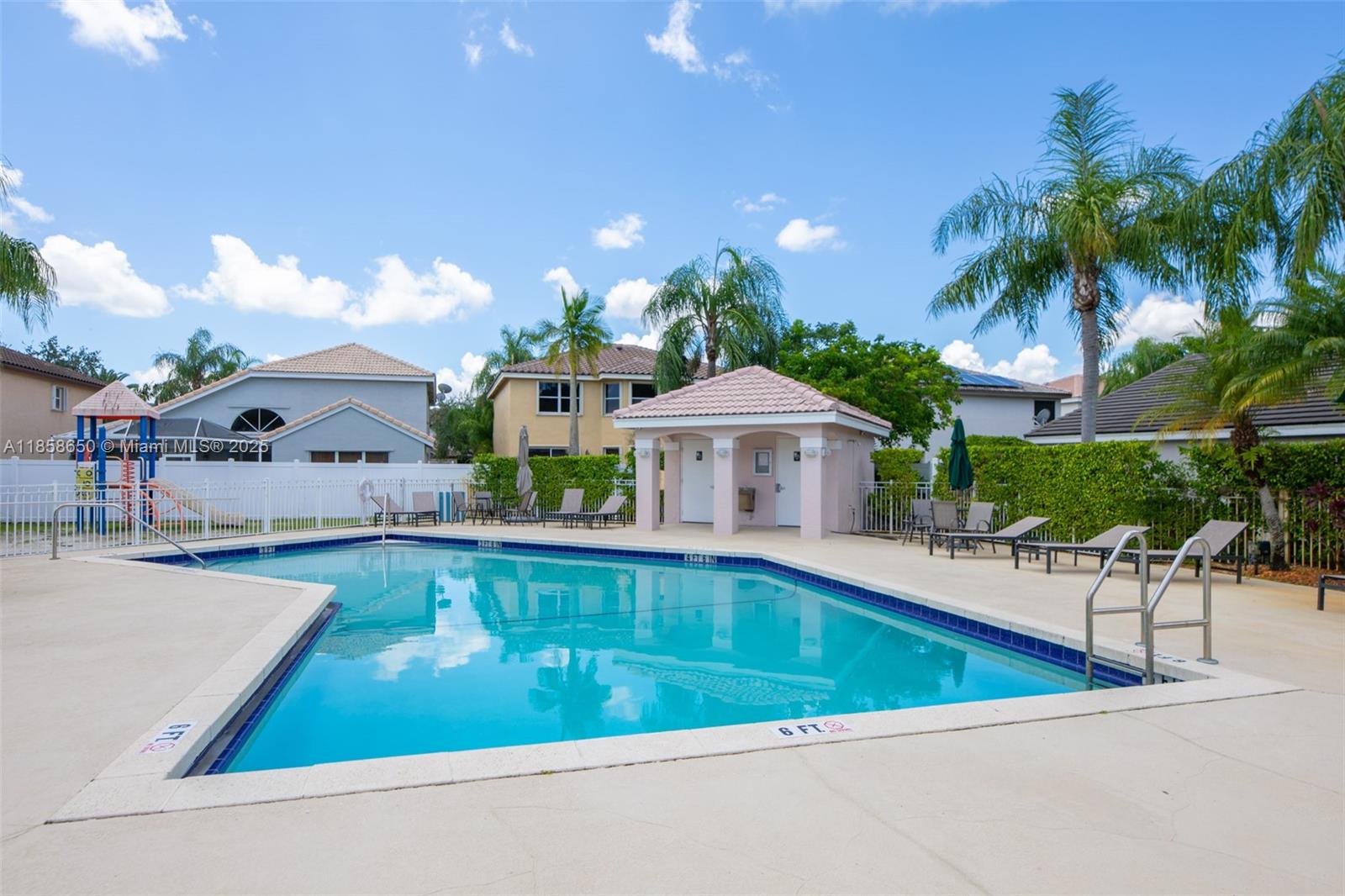 18196 Southwest 29th Street Miramar, FL 33029 - Photo 53 of 54 a view of a house with swimming pool and sitting area