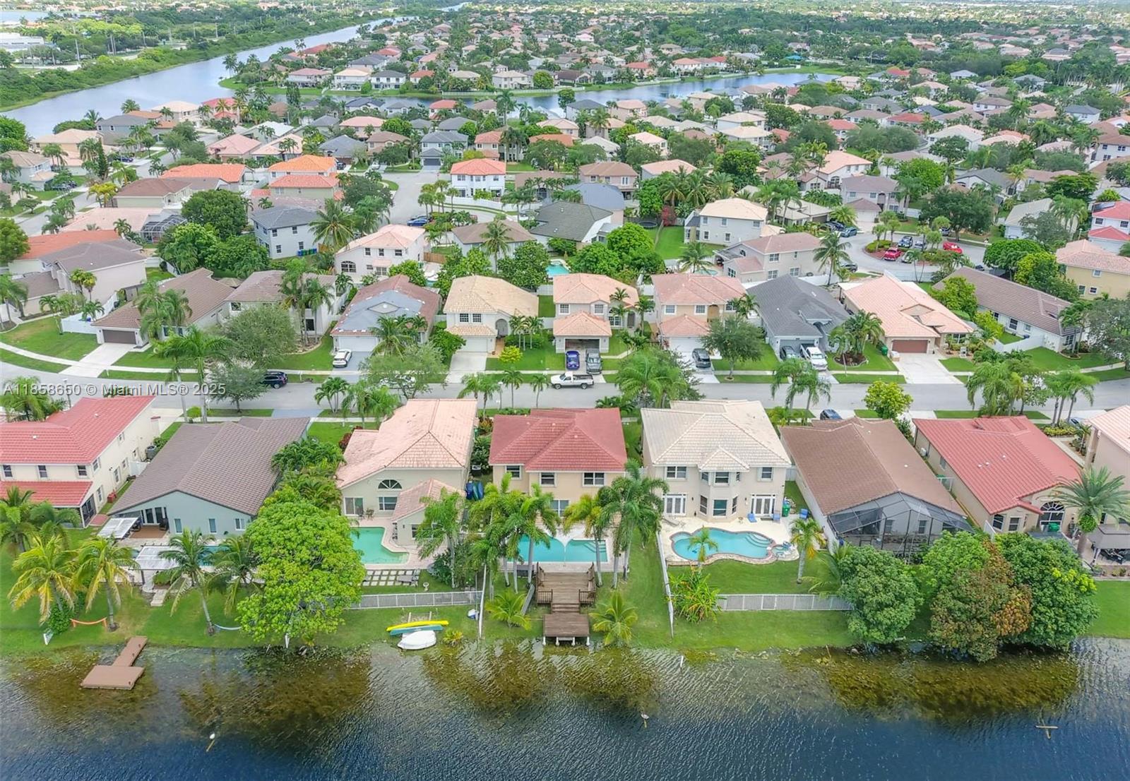 18196 Southwest 29th Street Miramar, FL 33029 - Photo 9 of 54 an aerial view of residential houses with outdoor space