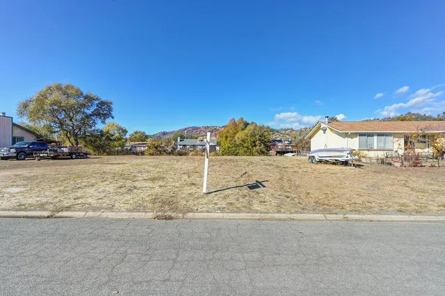 a view of house with outdoor space and seating