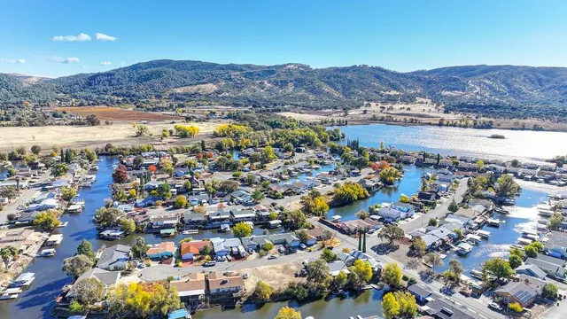 a view of a city with mountains in the background