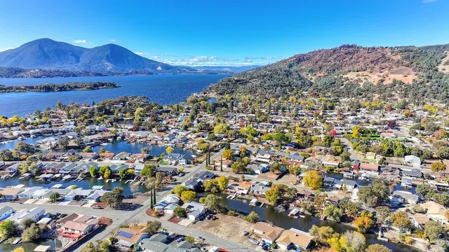 a view of a city with mountains in the background