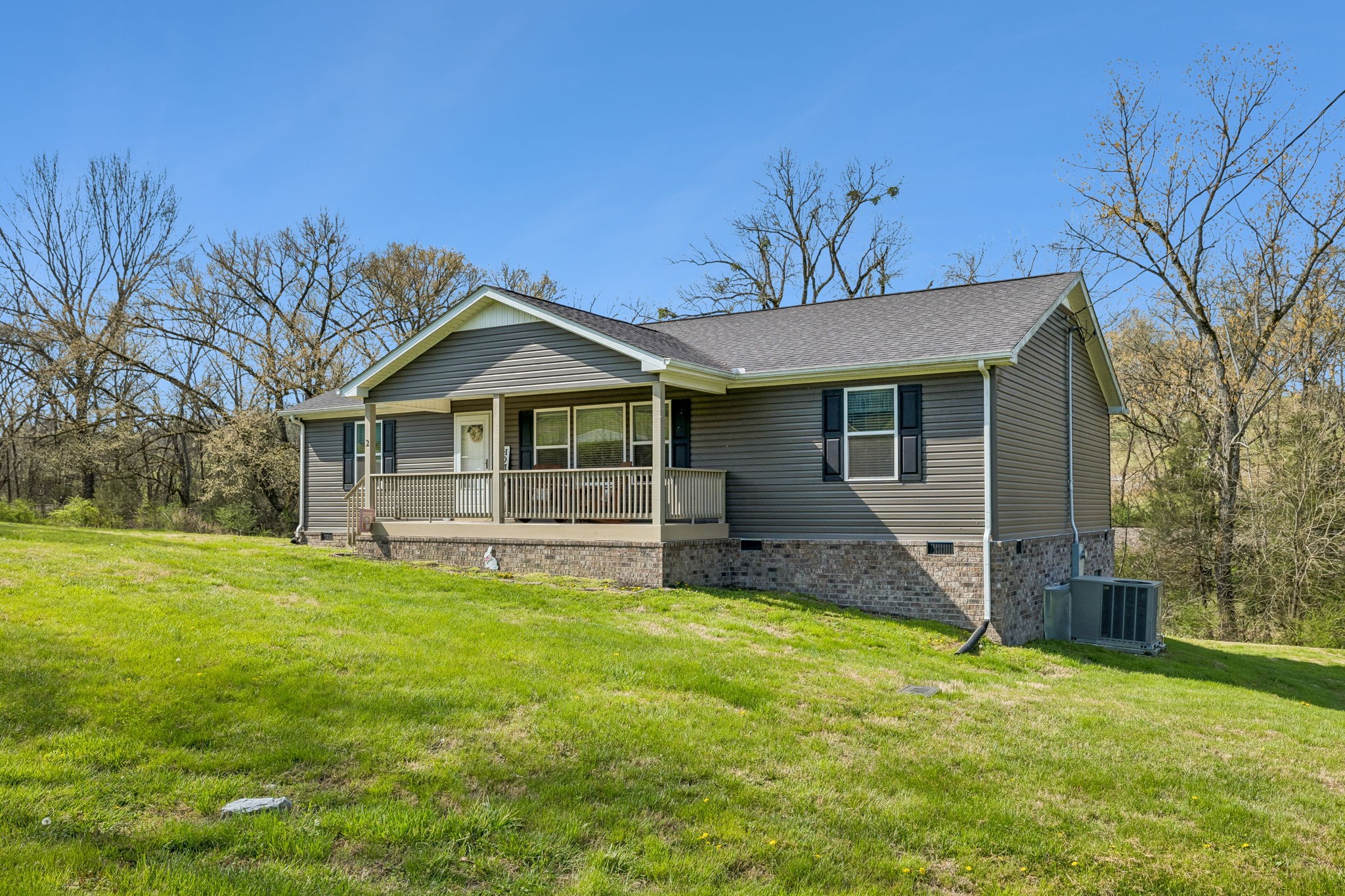 2 Hickman Creek Road North Hickman, TN 38567 - Photo 2 of 31 a house view with a garden space
