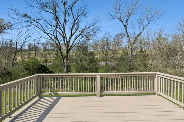 a view of a wooden roof deck