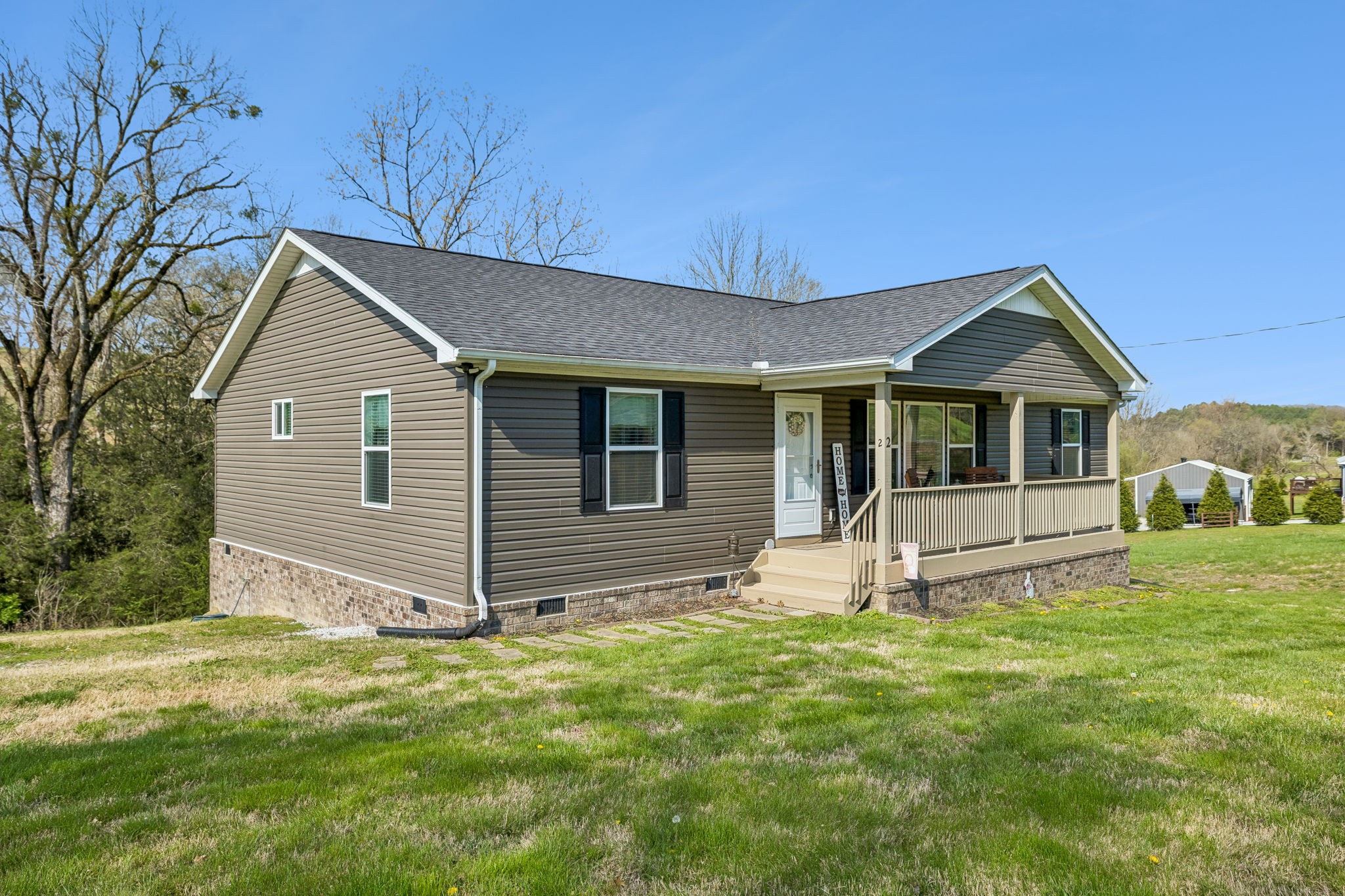 2 Hickman Creek Road North Hickman, TN 38567 - Photo 3 of 31 a front view of a house with a yard