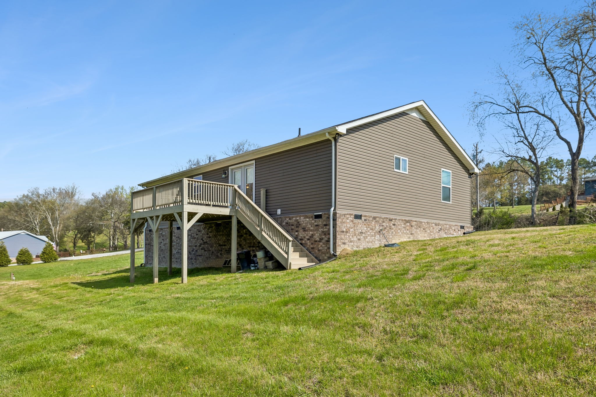 2 Hickman Creek Road North Hickman, TN 38567 - Photo 31 of 31 a house with huge green field in front of it