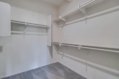 a view of an empty walk in closet