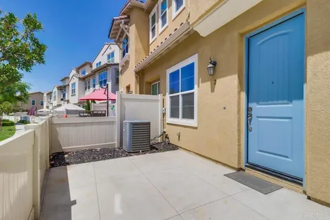 a front view of a house with a garage