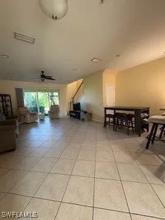 a lobby with furniture and floor to ceiling window