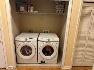 a utility room with dryer and washer