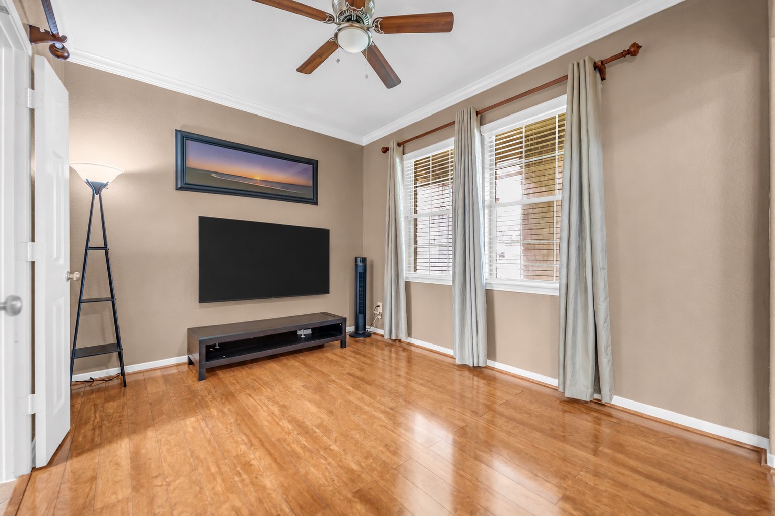 5406 Quarry Ridge Road Richmond, TX 77407 - Photo 7 of 36 Light-filled formal dining room with versatile living space, beautiful flooring, and endless possibilities for elegant dining, a sophisticated lounge, a home office, or a creative flex space.