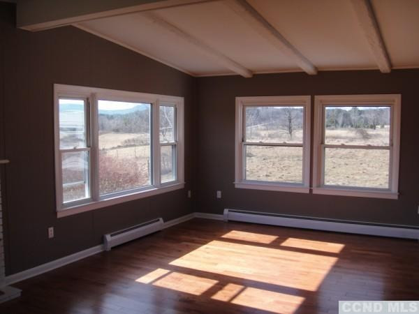 53 N Road Rensselaerville, NY 12120 - Photo 3 of 5 an empty room with wooden floor and windows