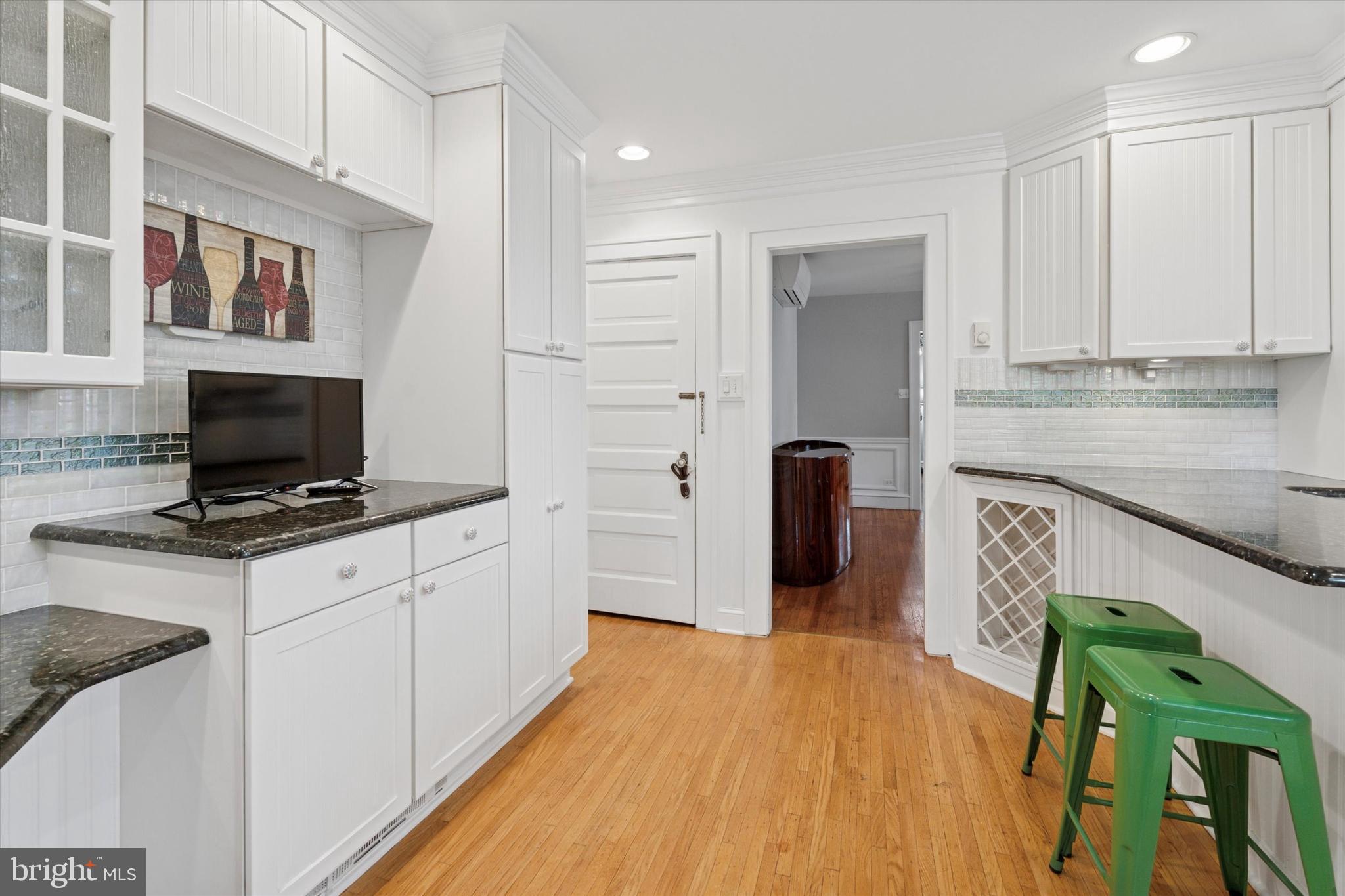 1442 Dorchester Road Havertown, PA 19083 - Photo 11 of 45 a kitchen with stainless steel appliances granite countertop a stove and a refrigerator