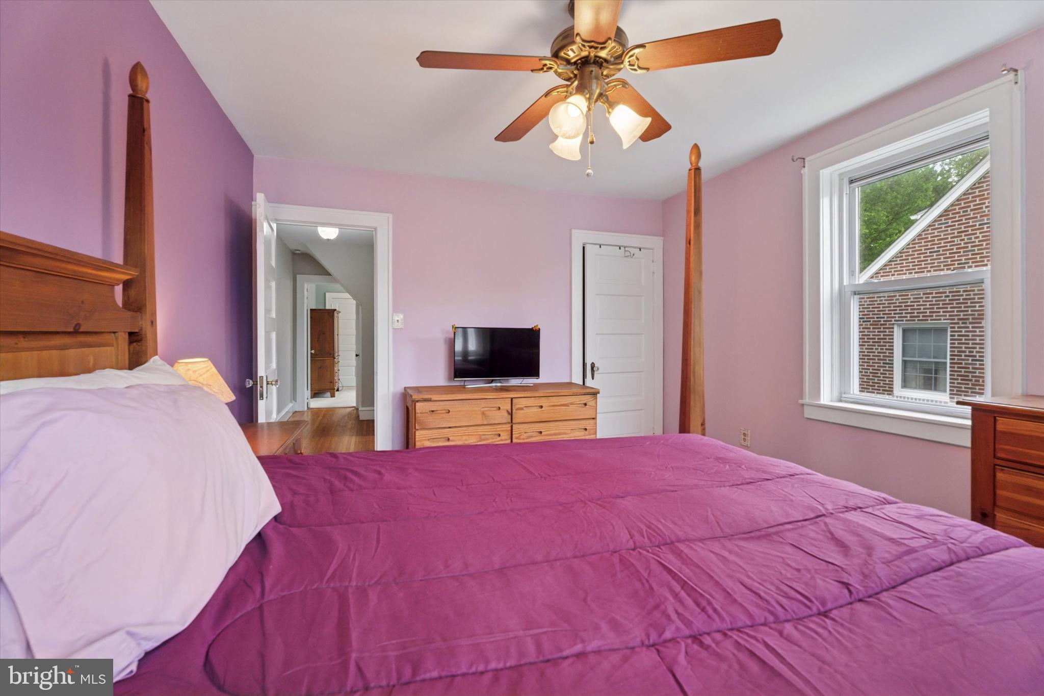 1442 Dorchester Road Havertown, PA 19083 - Photo 18 of 45 a bed room with a bed and a flat screen tv
