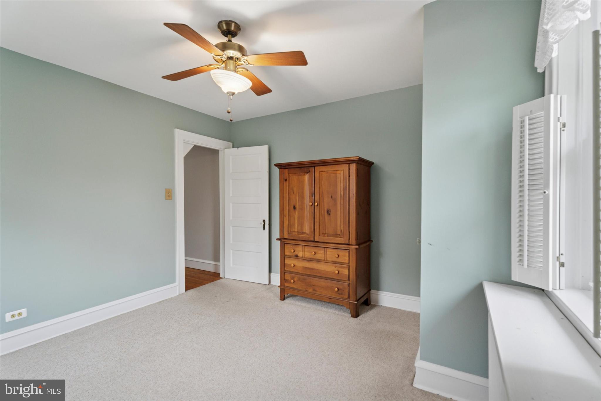 1442 Dorchester Road Havertown, PA 19083 - Photo 22 of 45 a view of an empty room with a ceiling fan