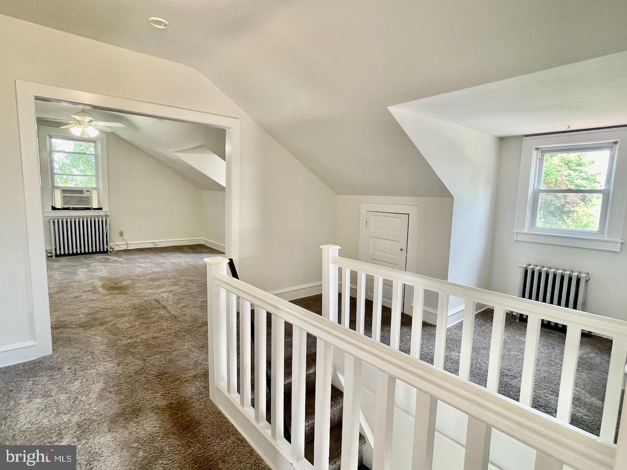1442 Dorchester Road Havertown, PA 19083 - Photo 23 of 45 a view of staircase with white walls and a window