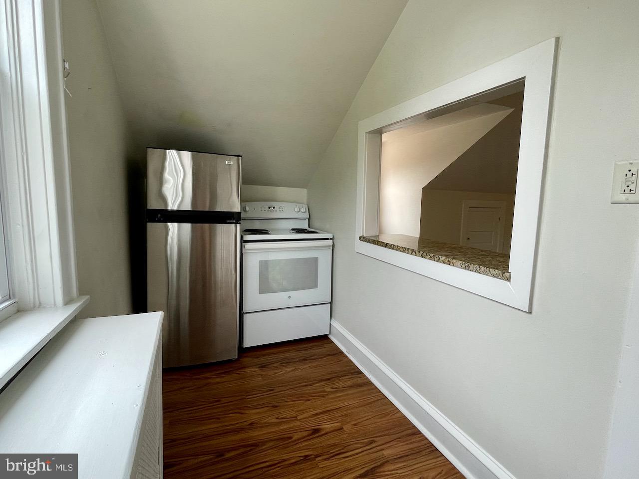 1442 Dorchester Road Havertown, PA 19083 - Photo 27 of 45 a kitchen with a refrigerator and a microwave