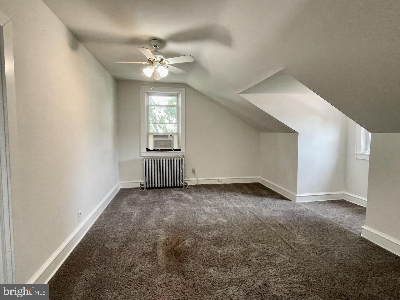 1442 Dorchester Road Havertown, PA 19083 - Photo 29 of 45 a view of a livingroom with a ceiling fan and window