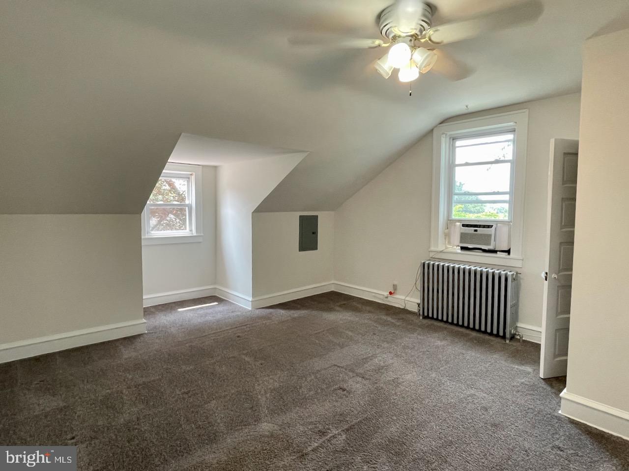 1442 Dorchester Road Havertown, PA 19083 - Photo 30 of 45 an empty room with windows and fan