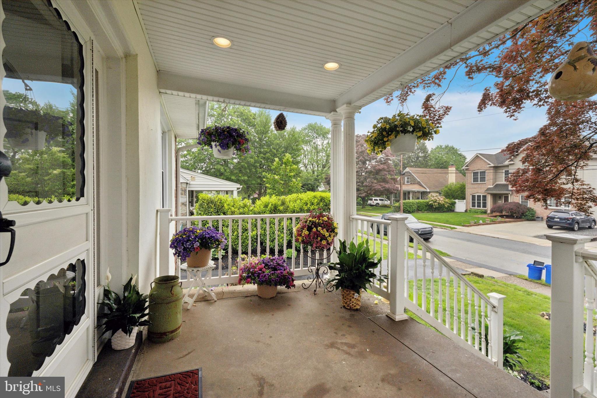 1442 Dorchester Road Havertown, PA 19083 - Photo 3 of 45 a living room with patio furniture and a floor to ceiling window
