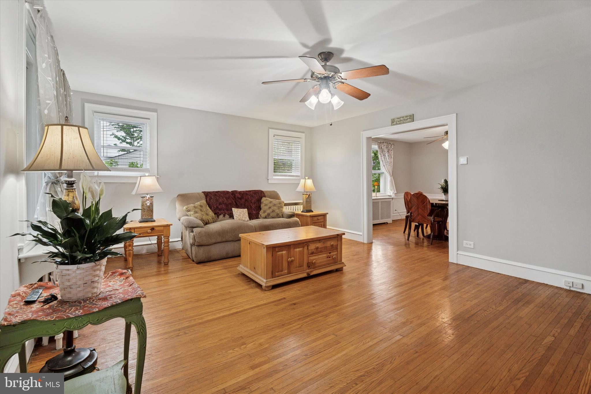 1442 Dorchester Road Havertown, PA 19083 - Photo 4 of 45 a living room with furniture and a chandelier