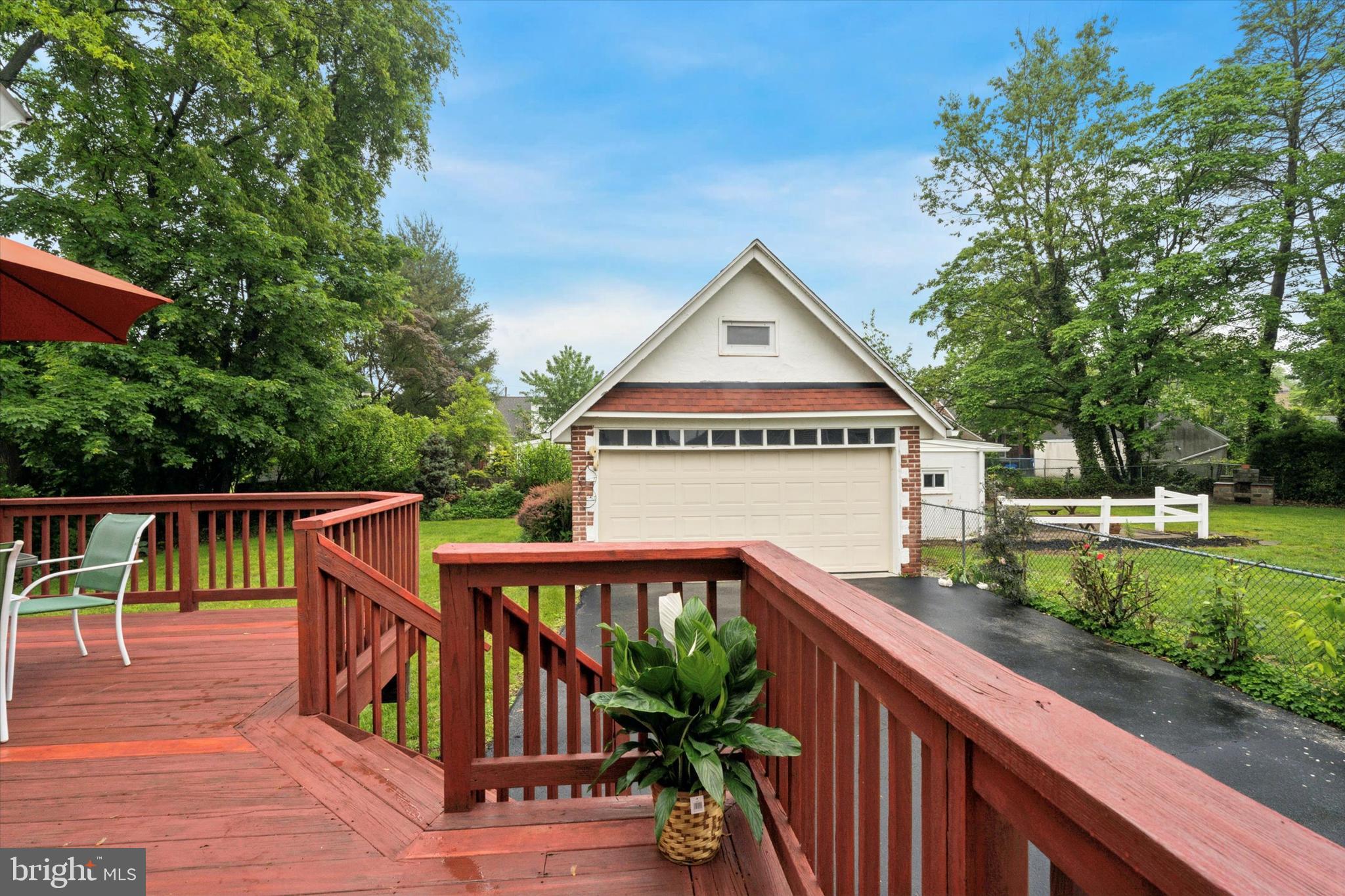 1442 Dorchester Road Havertown, PA 19083 - Photo 41 of 45 a view of a wooden deck and a yard